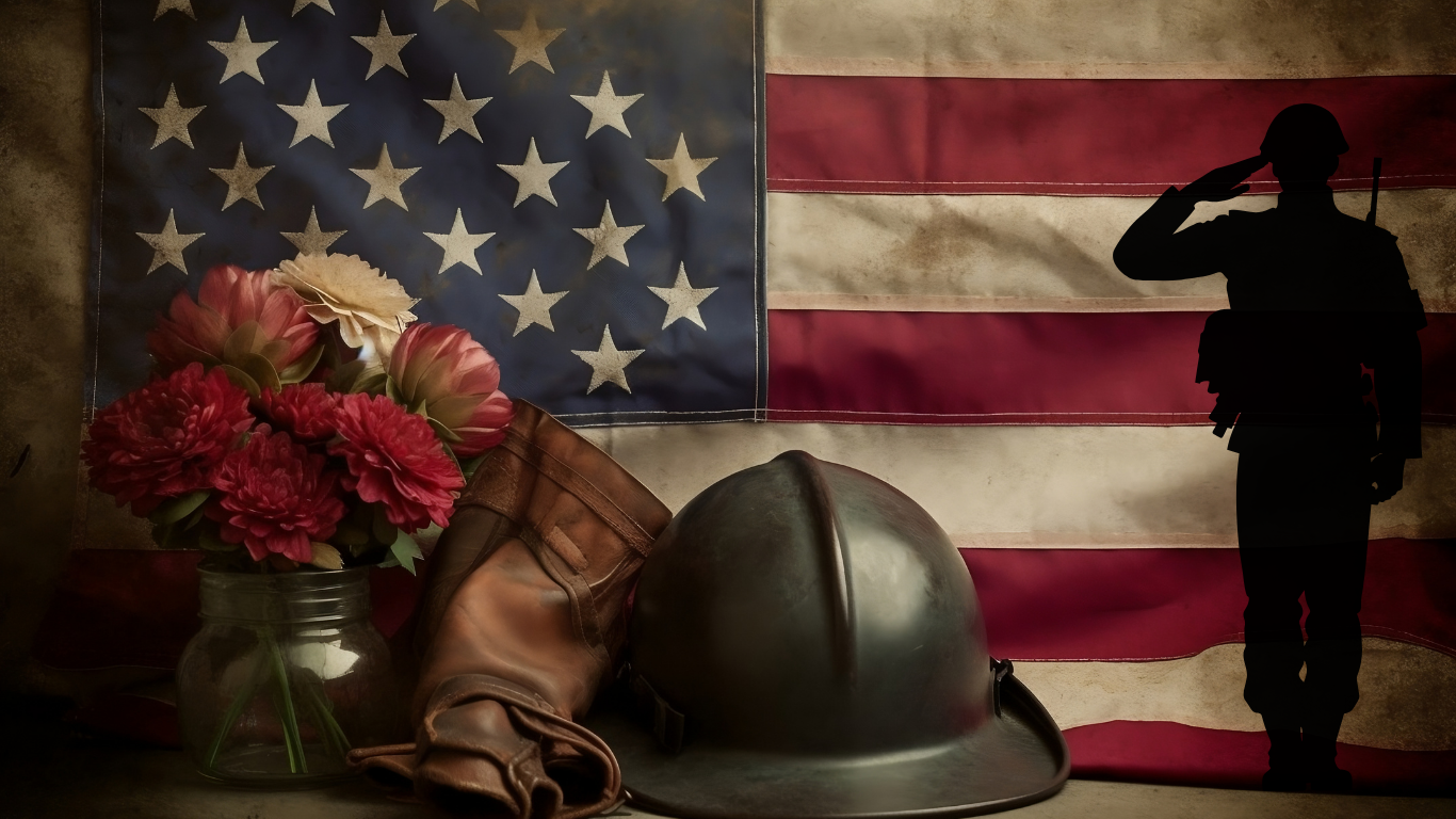 Memorial tribute with military helmet, boots, flowers and American flag